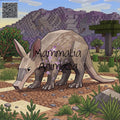 A pixel-art illustration of a large mammal-like creature standing in a blocky outdoor landscape with mountains, trees, and rocks. The creature is tan and gray with the overlaid text 'Mammalia Animalia.